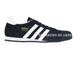G16025 adidas Dragon core black / white / gold met.